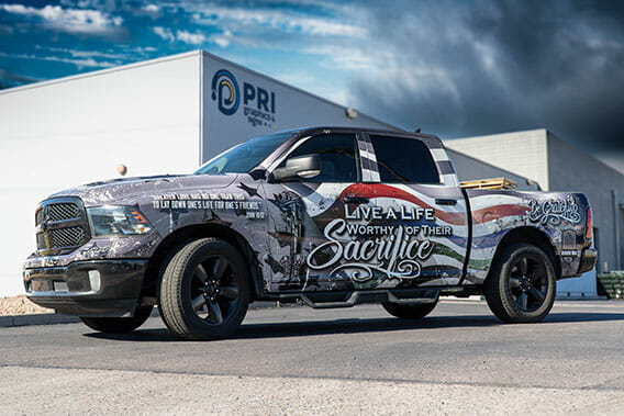 Printed vehicle wrap on a pickup truck