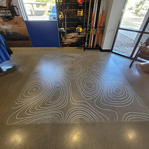 Clear textured floor graphic for the inside lobby of Empire Cat