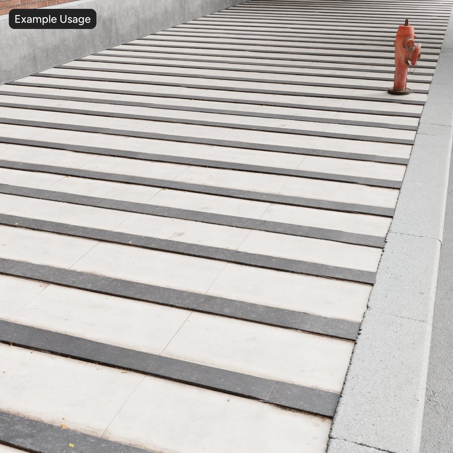 Smutsig betong med stenbelagd trottoar, svart och vitt