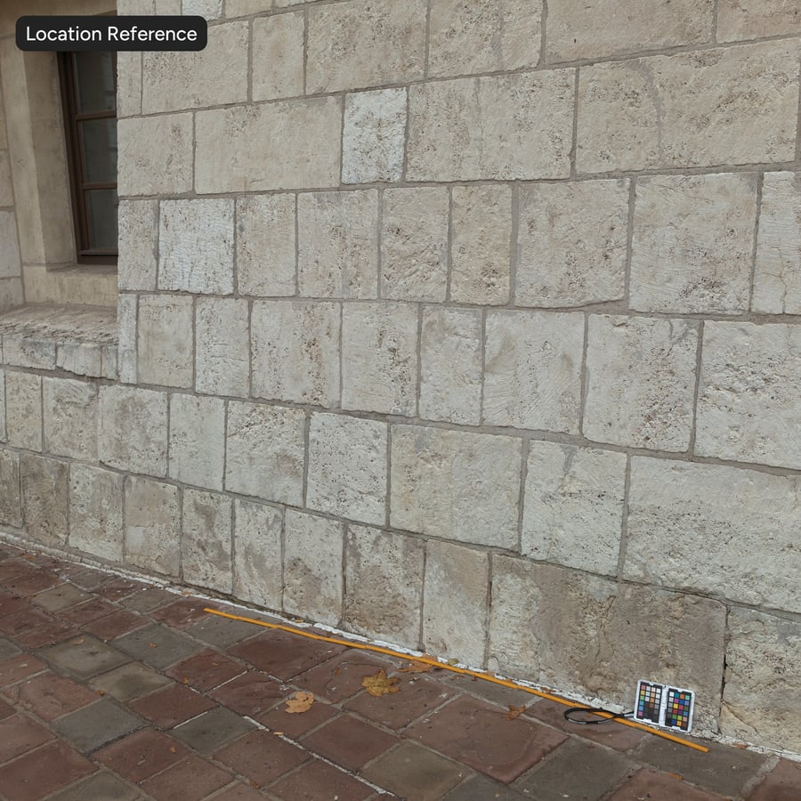 Texture d'un vieux mur en blocs de pierre érodés