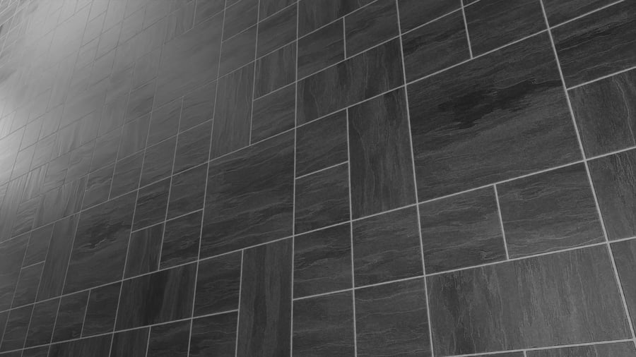 Textura de azulejo quadrado em cerâmica mate, cinzento escuro
