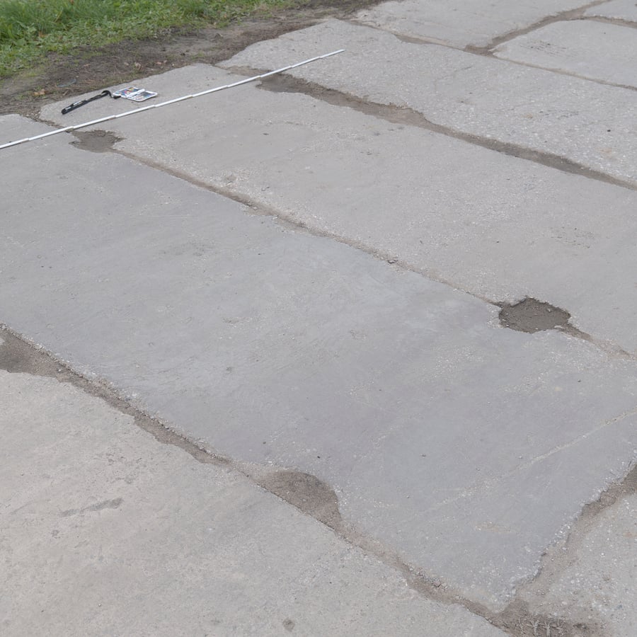 Worn Panel with Tie Holes Concrete Sidewalk Texture