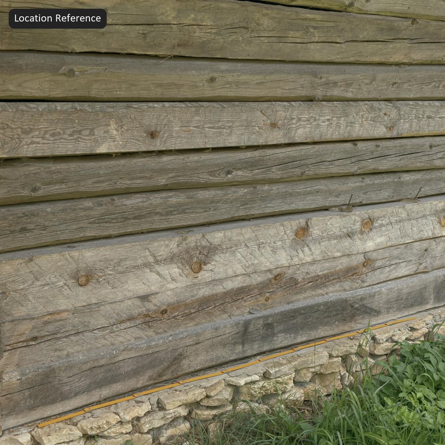 Texture murale du bardage en rondins de bois usés