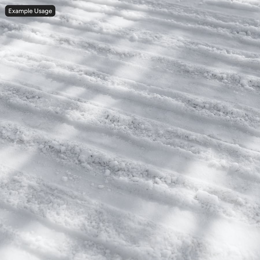 厚雪紋理上的輪胎印記