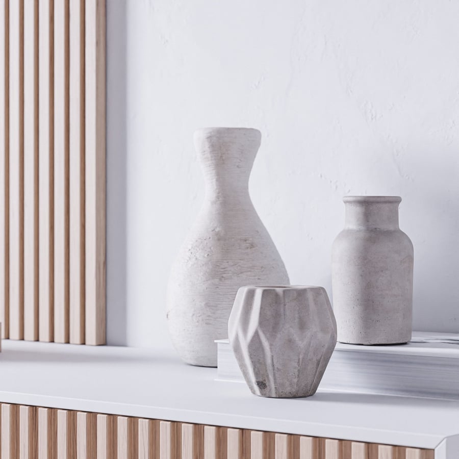 Modelos de vasos de concreto em forma de garrafa