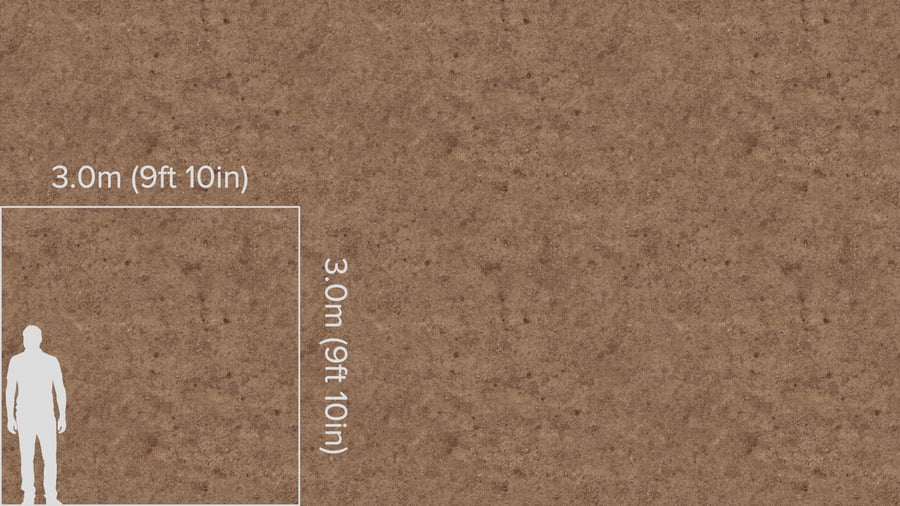 Pequenos seixos sobre textura de terra rachada