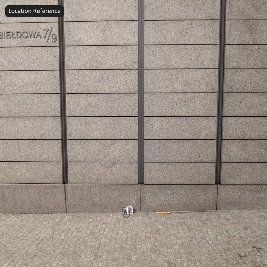Textura de revestimento de fachada em granito flamejado, cinza claro