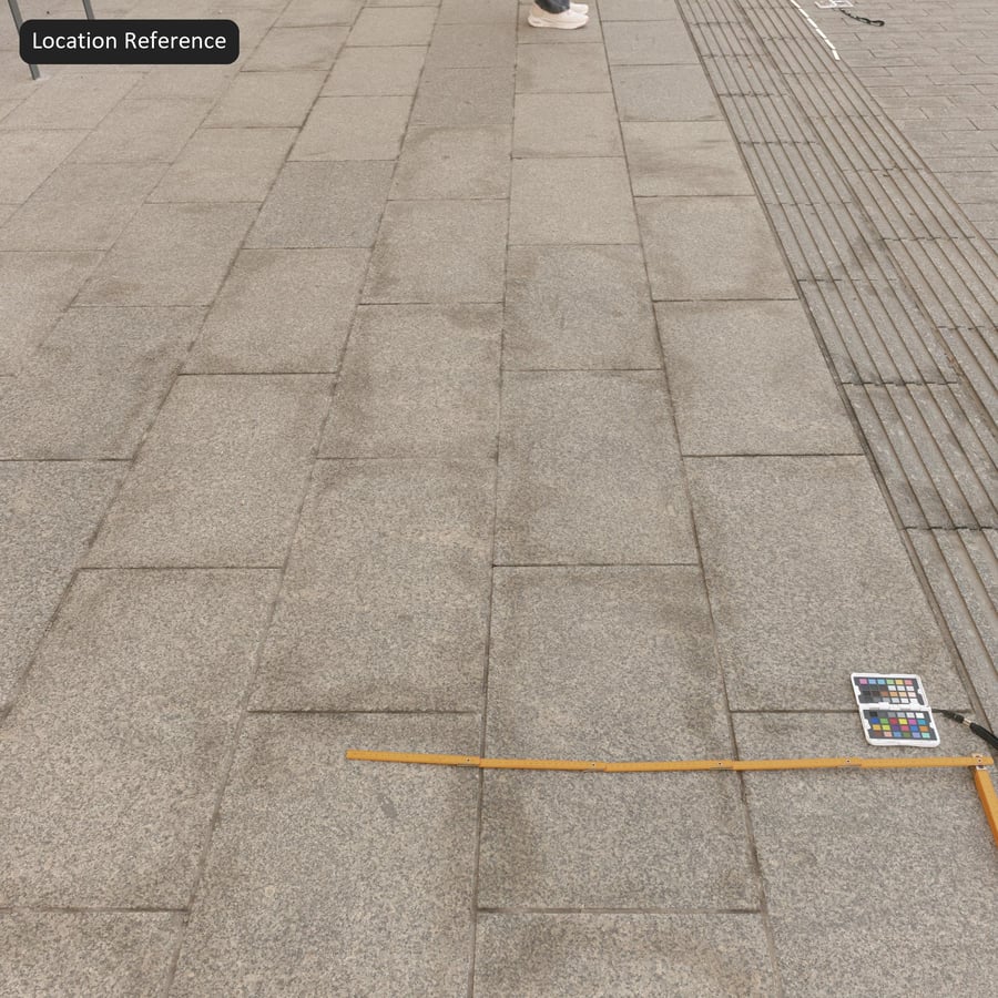 Textuur stoep van versleten granieten tegels