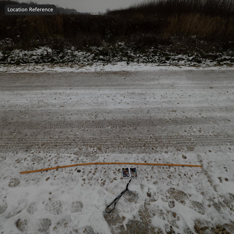 Tire Tracks on Snowy Road Texture