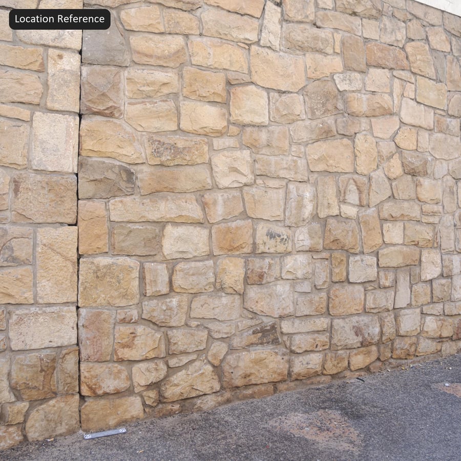 Kết cấu tường đá vụn ố màu, màu vàng