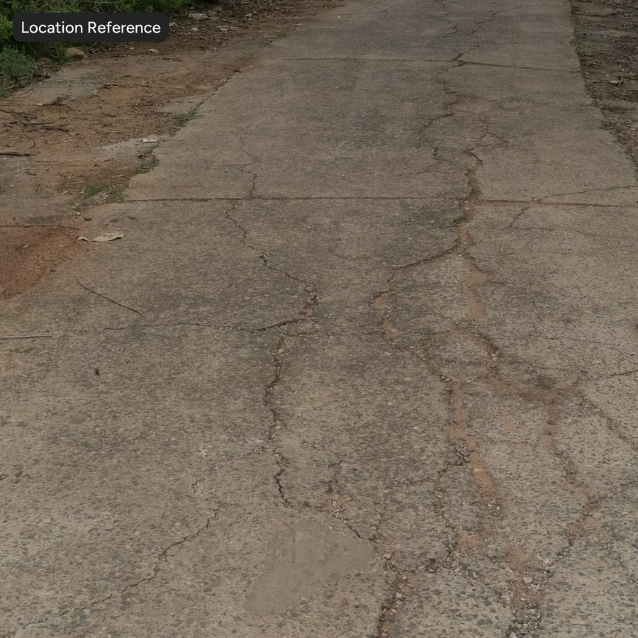Heavily Cracked Aggregate Concrete Ground Texture, Brown