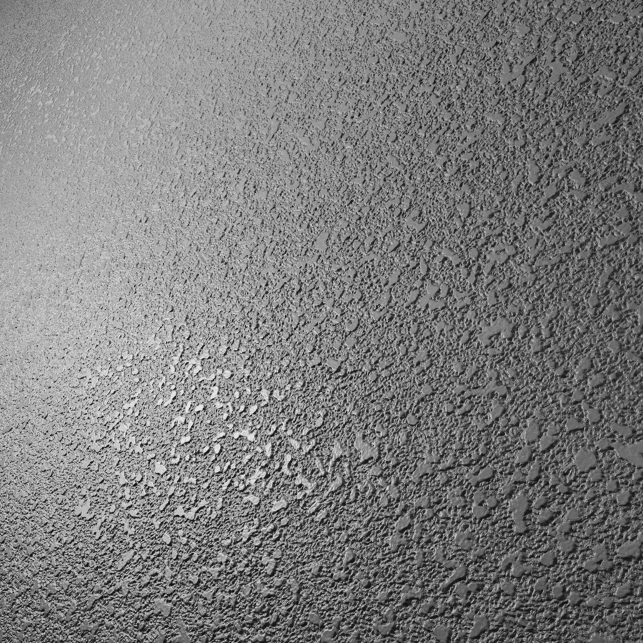Pequena textura plástica com grãos irregulares, preta