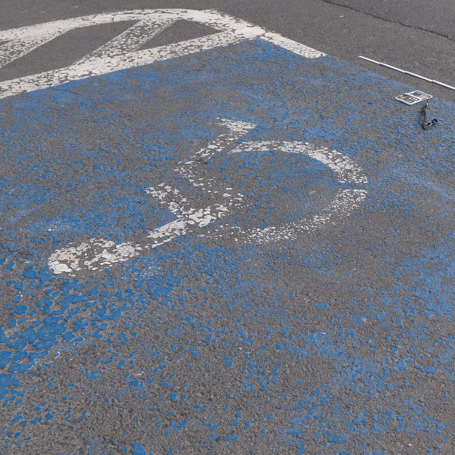 Worn Painted Accessible Parking Space Asphalt Texture