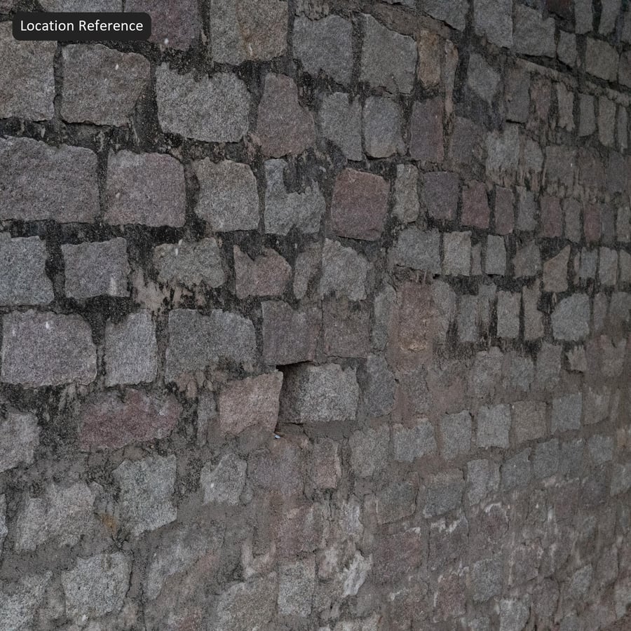 Verwitterte Granitblock-Wandtextur, warmes Grau