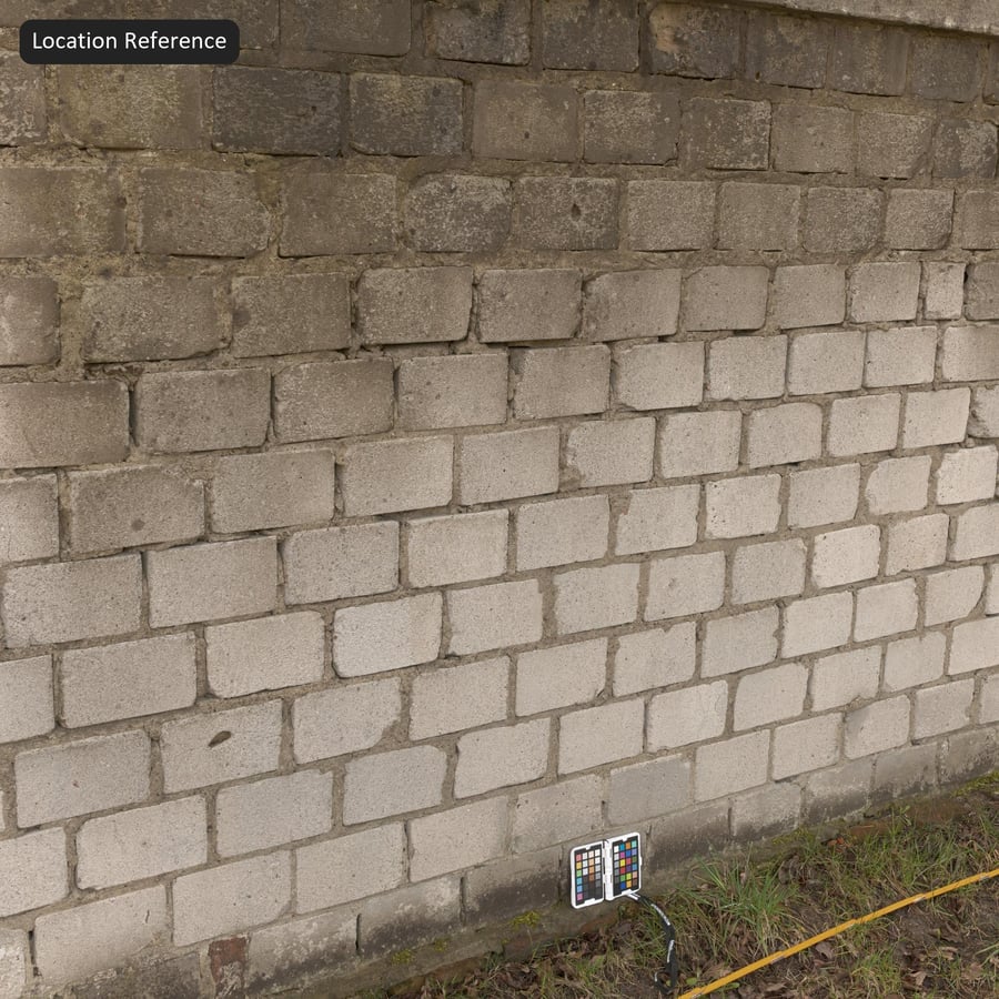 Tekstura kwadratowej ściany z bloków żużlowych