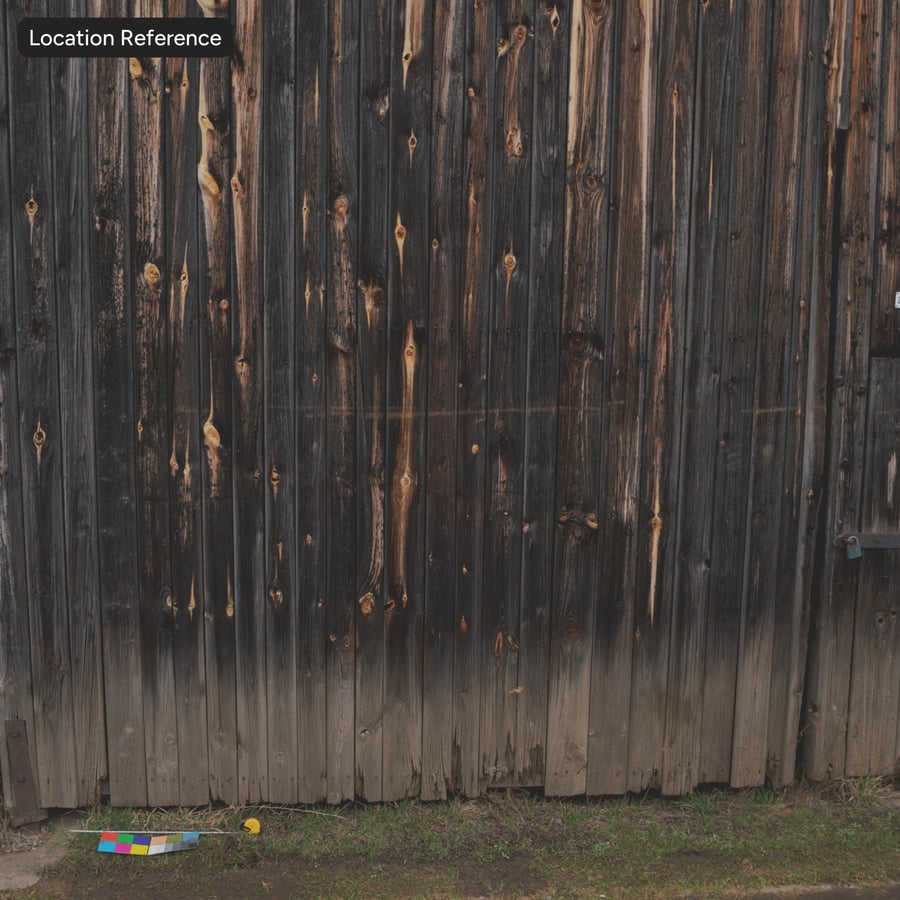 Texture murale en bois de grange brûlé