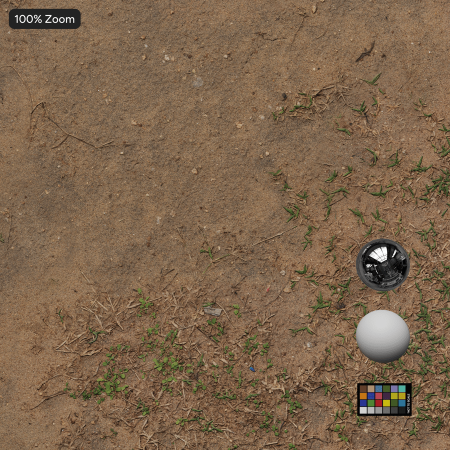 Texture d'herbe parsemée sur sol en terre battue