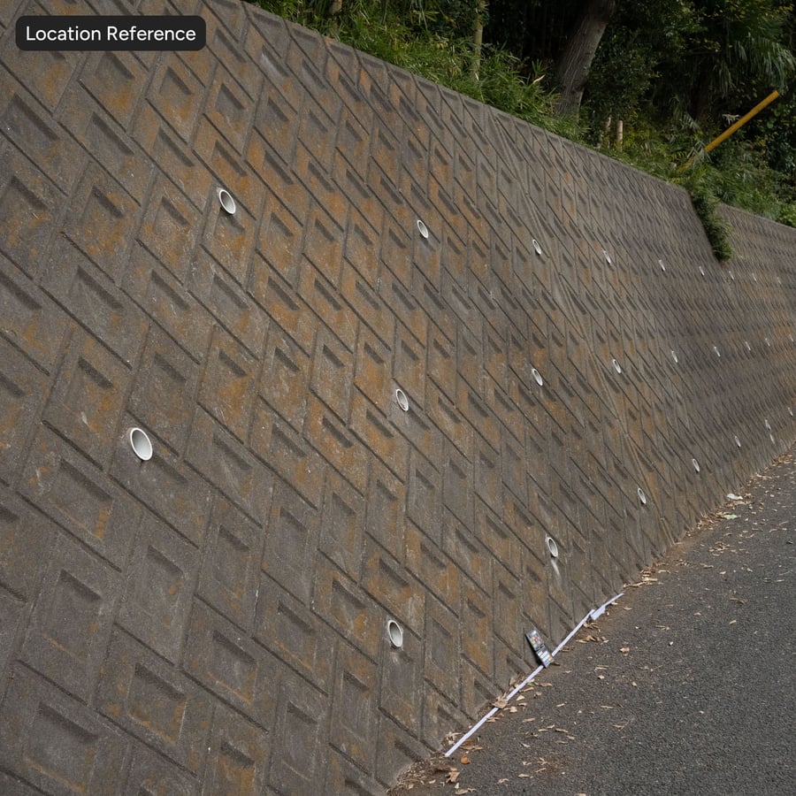 Stamped Herringbone Concrete Retaining Wall Texture