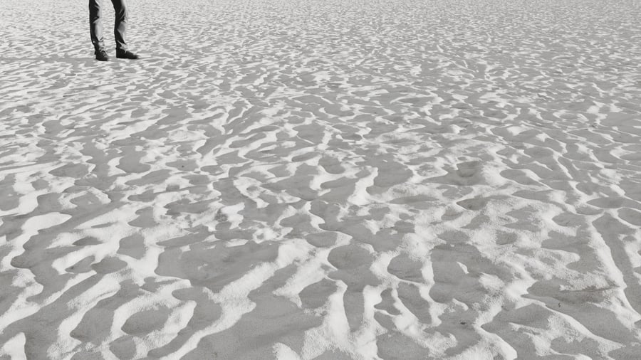 Shoe Soles on Sand Texture, White