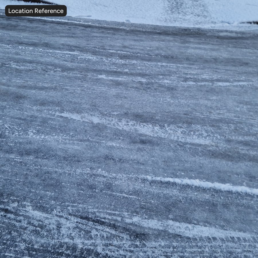 Däckspår på snöig asfalt Textur