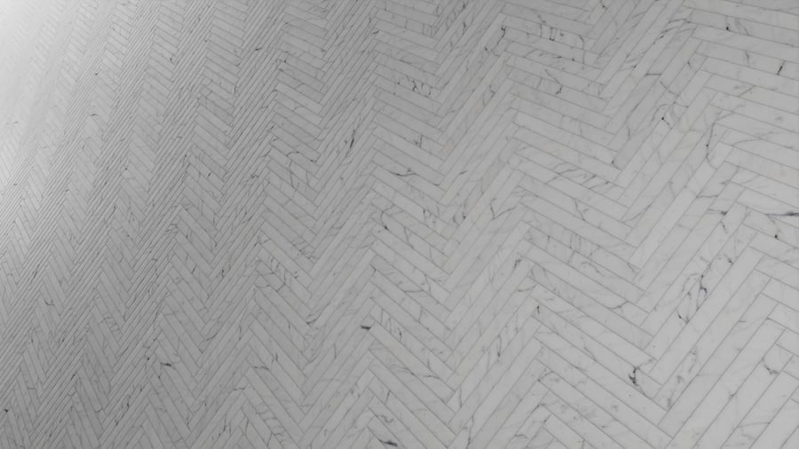 Textura de azulejo mate em mármore em espinha, branco
