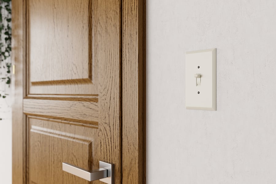 Três modelos de interruptores de luz, branco