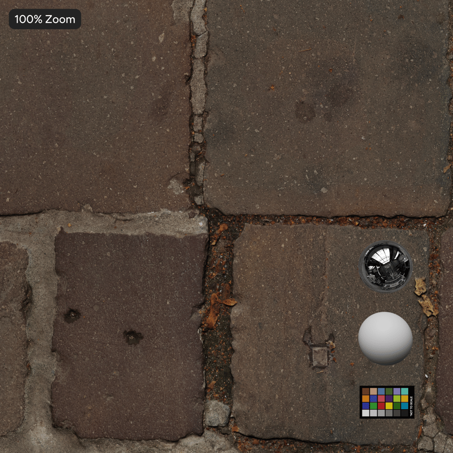 磨損的鵝卵石鋪路磚紋理與落葉