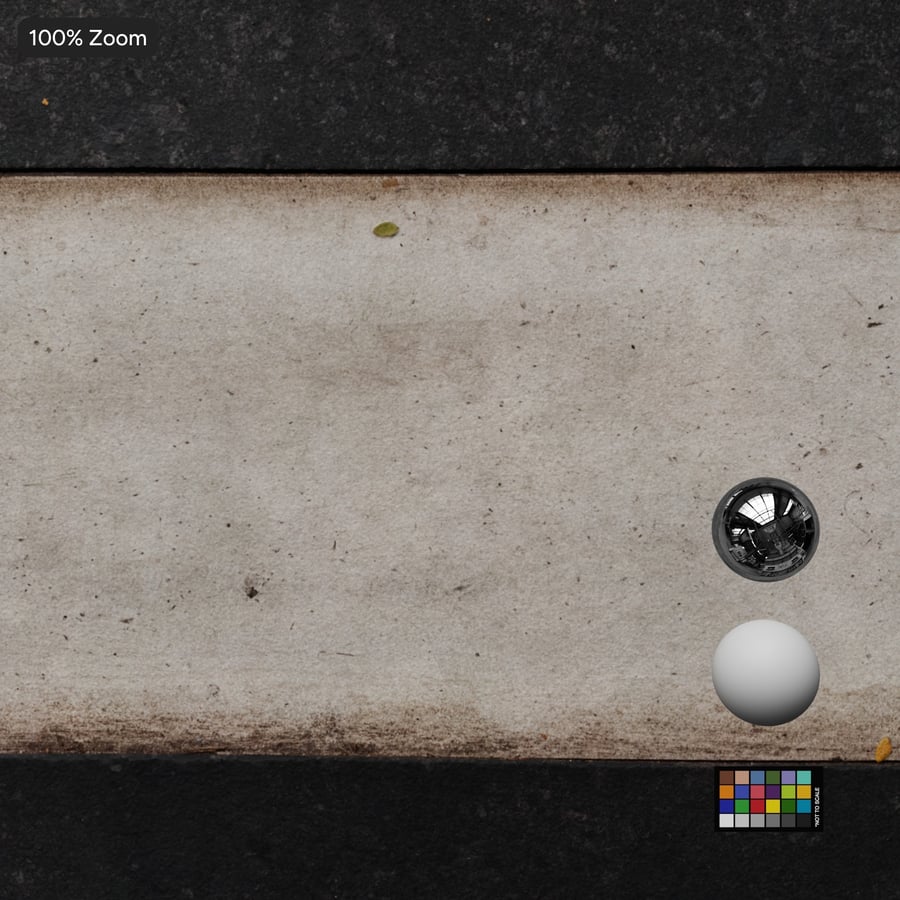 Smutsig betong med stenbelagd trottoar, svart och vitt