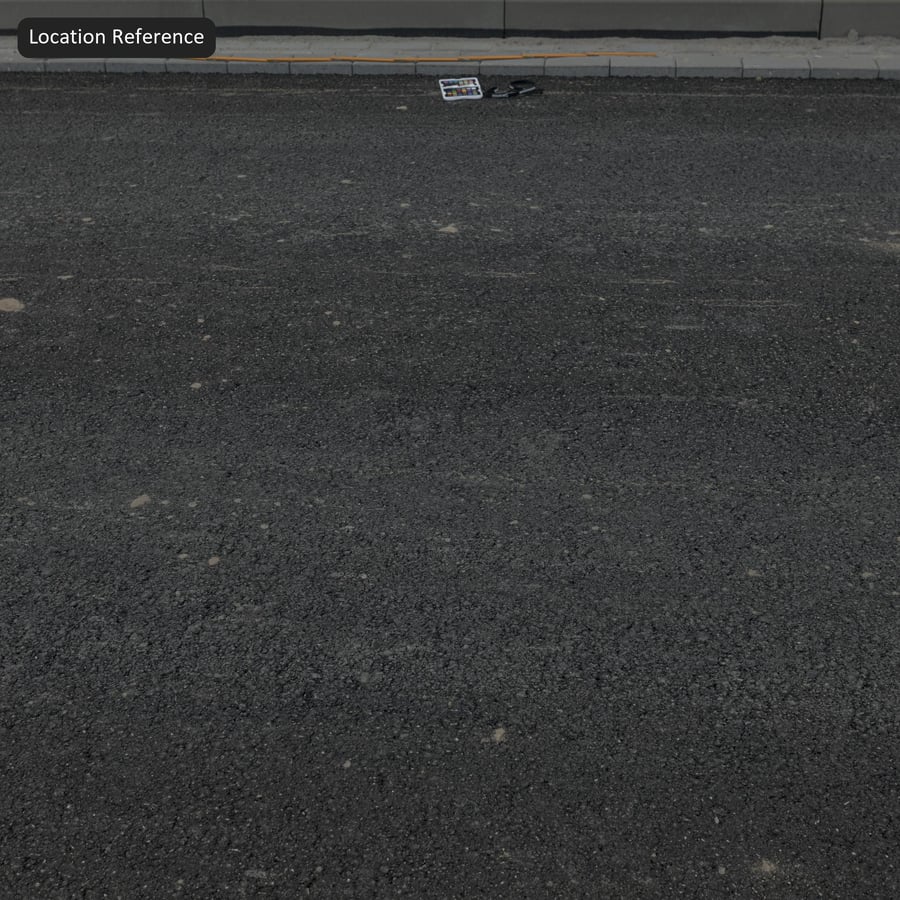 磨耗したアスファルト道路の質感