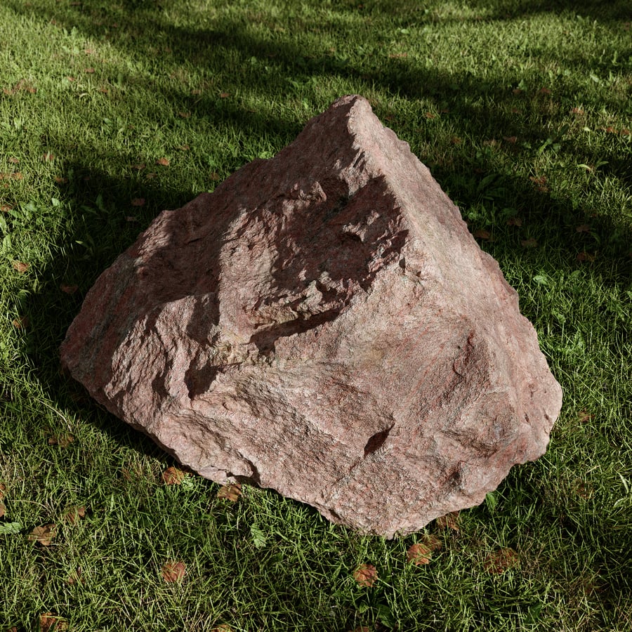 Modelo de pedra grande com saliências e covinhas, vermelho
