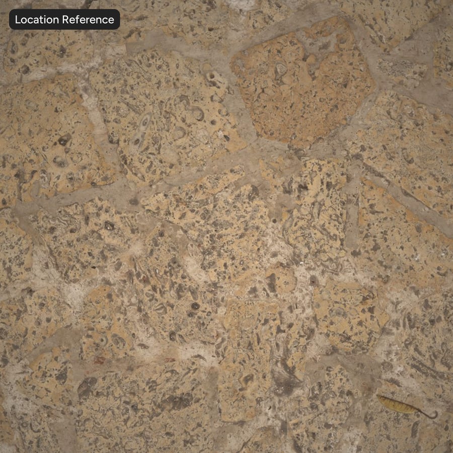 Textura de calçada de pedra de entulho muito desgastada, amarelo