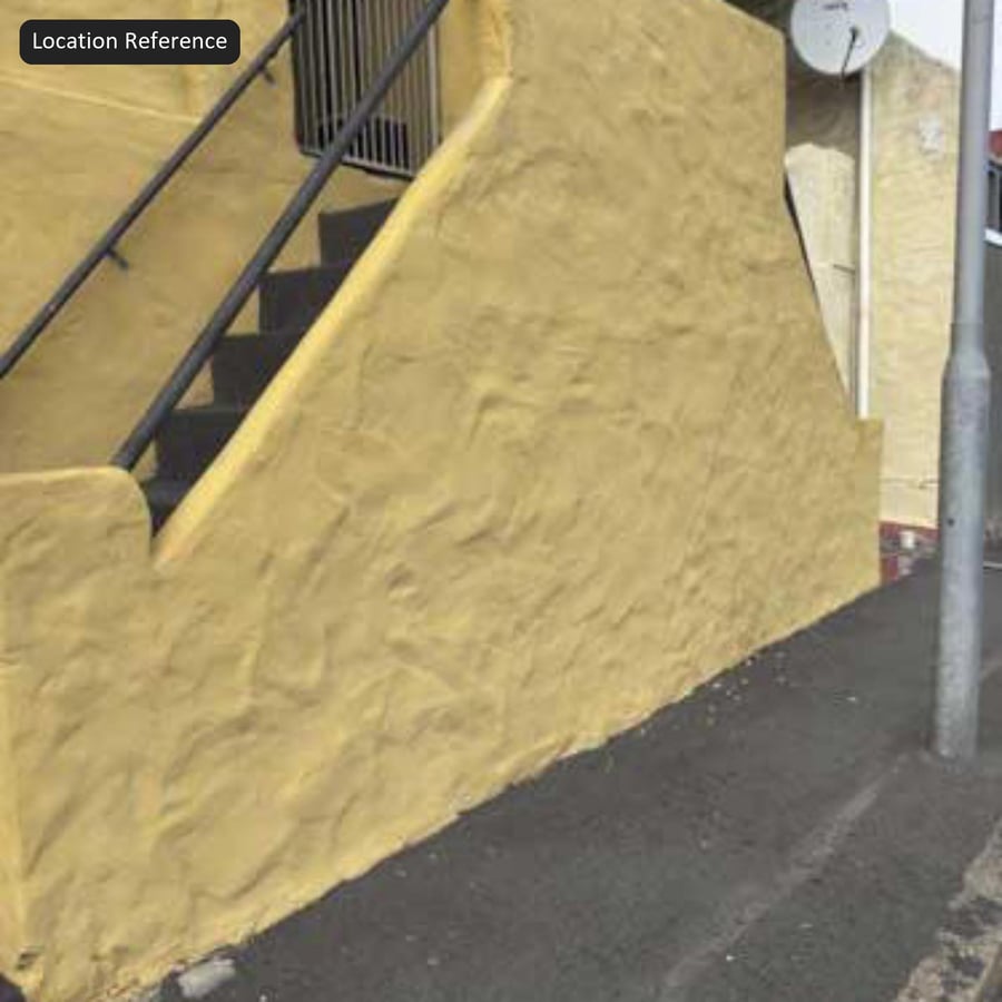 Swirled Skip Trowel Stucco Wall Texture, Golden Yellow