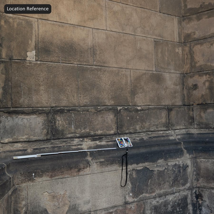 Texture de mur en blocs de pierre vieillis et écaillés