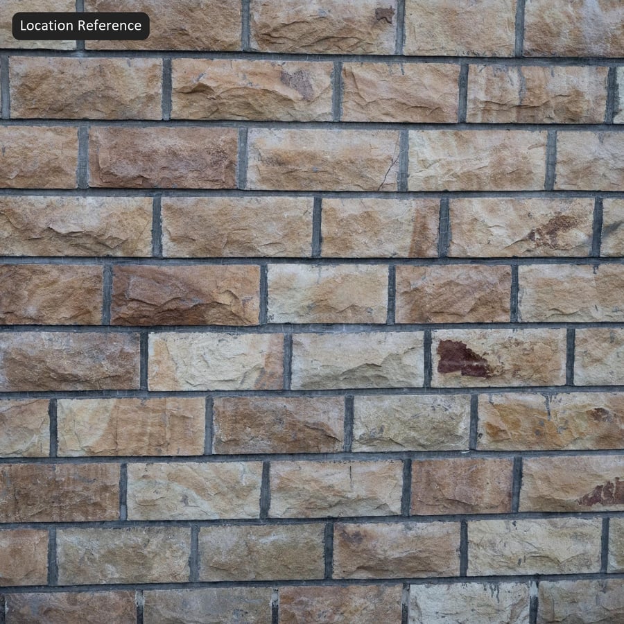 Textur av stenblocksmur, gul