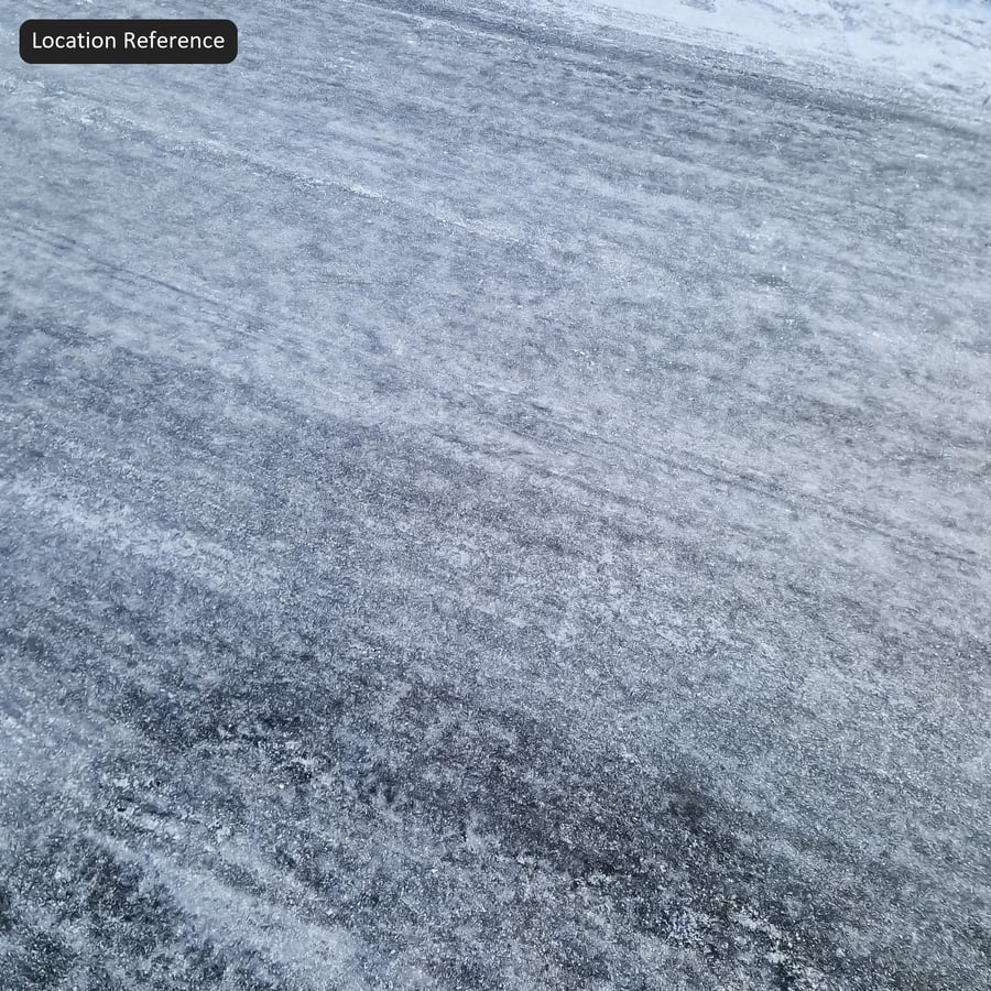 Tire Marks on Icy Asphalt Road Texture