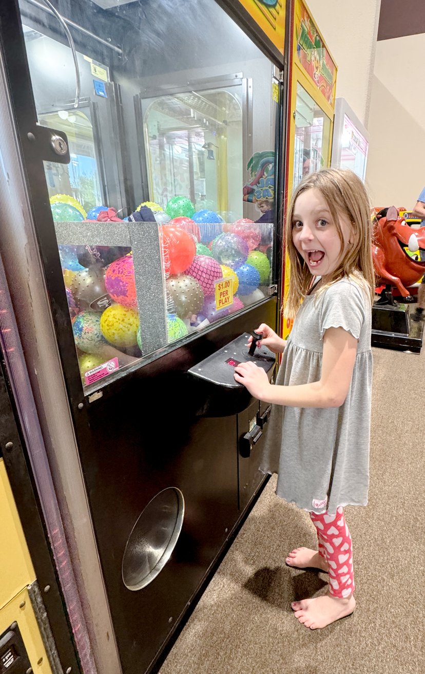 Exciting arcade area at Central Arkansas Inflatables Indoor Park featuring classic games, prize machines, and family entertainment in Bryant Arkansas