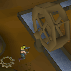 Repairing a Motherlode Mine water wheel with a hammer