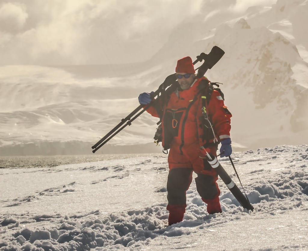 Person in red gear on snow