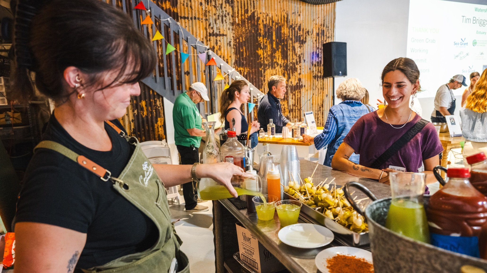 People enjoying drinks and food
