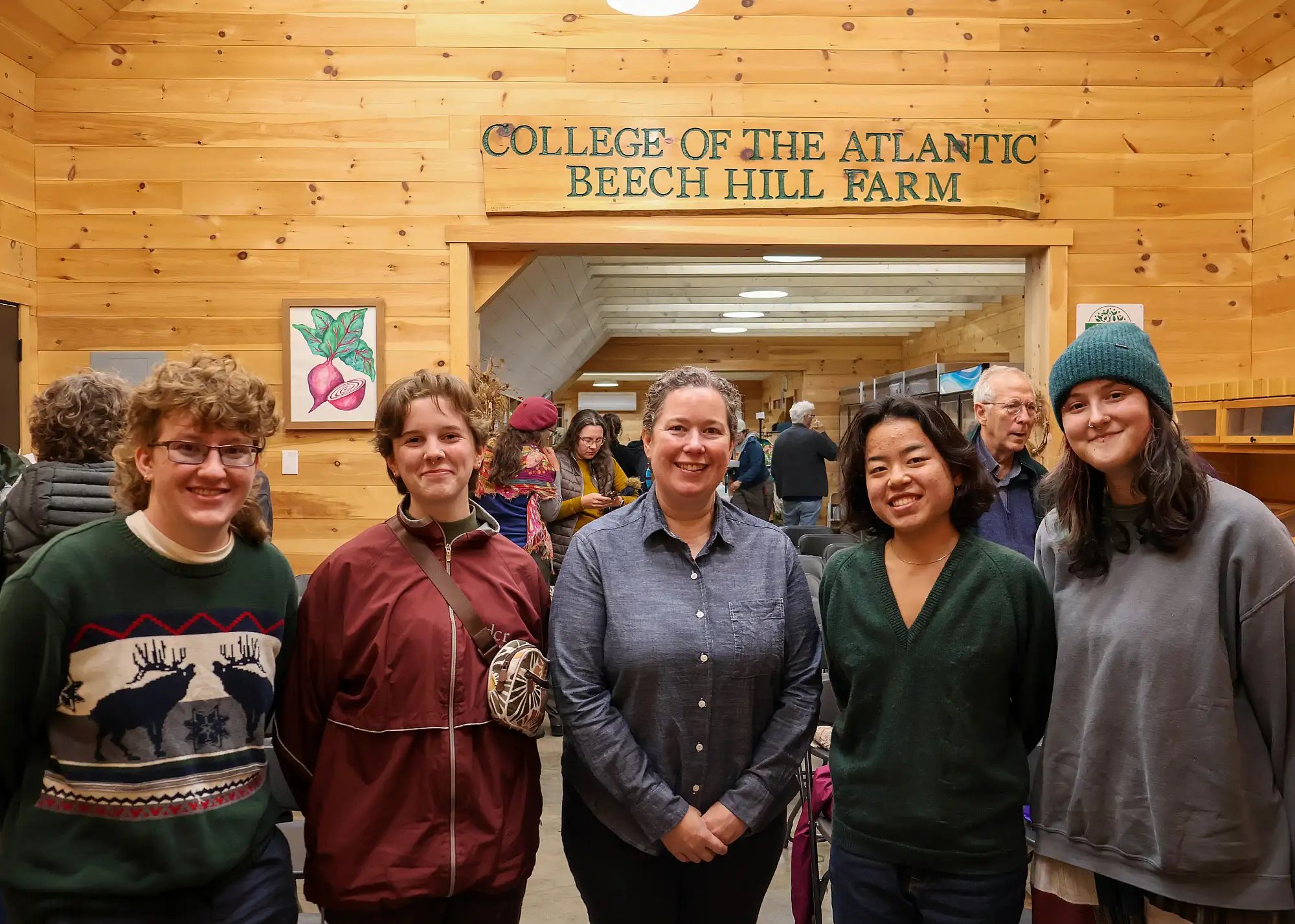 Group of people at a farm event.