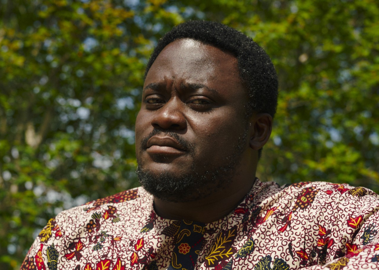 headshot of Bayo Akomolafe