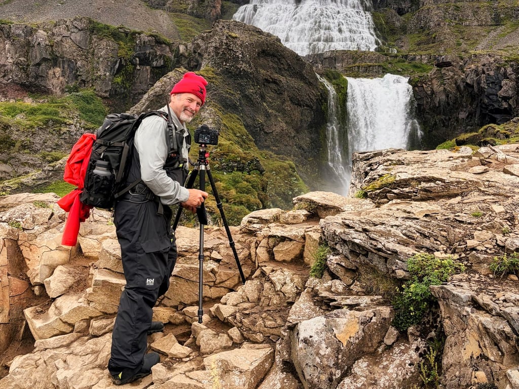 Photographer near a waterfall.