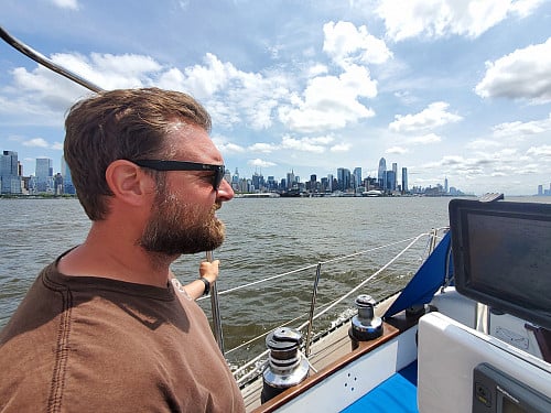 Sailing with city skyline in background