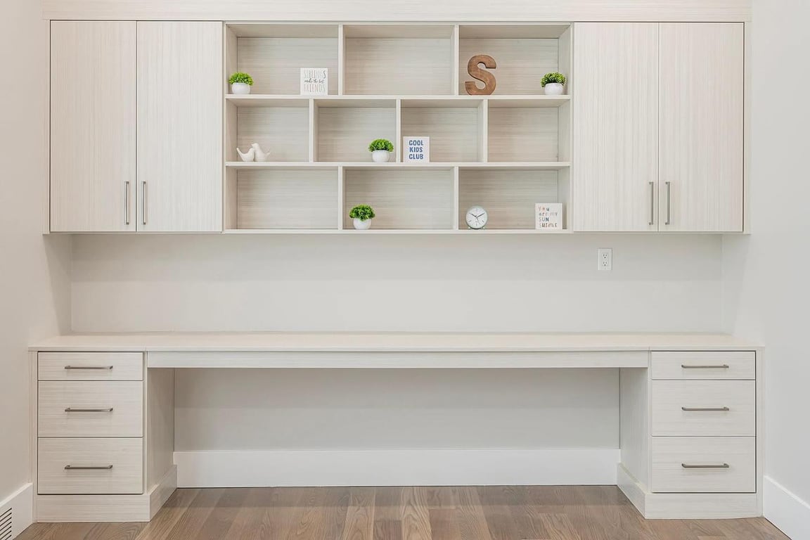 A dedicated workspace with integrated shelving and desk surfaces.