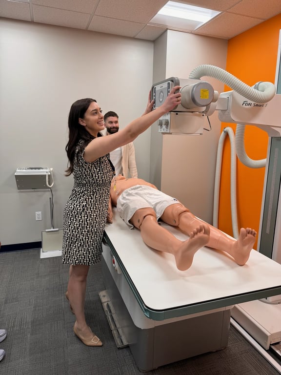 Students work with X-ray equipment in a CAHE radiography suite.