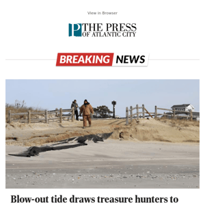 Blow-out tide draws treasure hunters to otherwise deserted beach in Strathmere