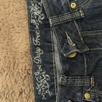 Vintage low-rise bootcut jeans in dark blue denim