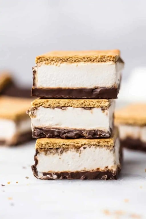 Protein Frozen S’mores – A High-Protein Summer Treat You’ll Love 1 Stack of protein frozen s’mores layered with graham crackers, chocolate, and whipped protein filling.