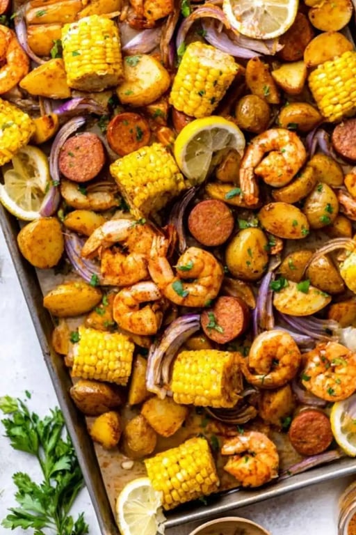 Easy Sheet Pan Shrimp Boil – A High-Protein Dinner Favorite 1 Sheet pan shrimp boil with shrimp, sausage, corn on the cob, and lemon wedges