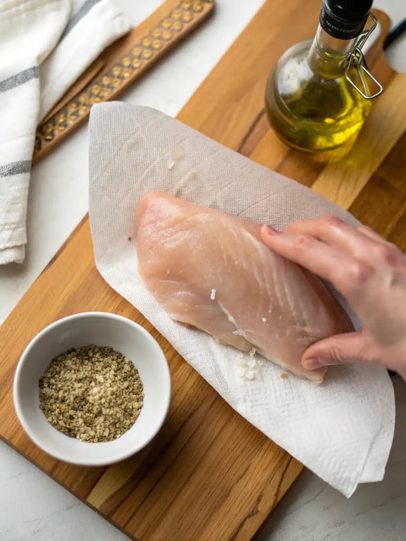 Step 2 for air fryer chicken breast — process in progress